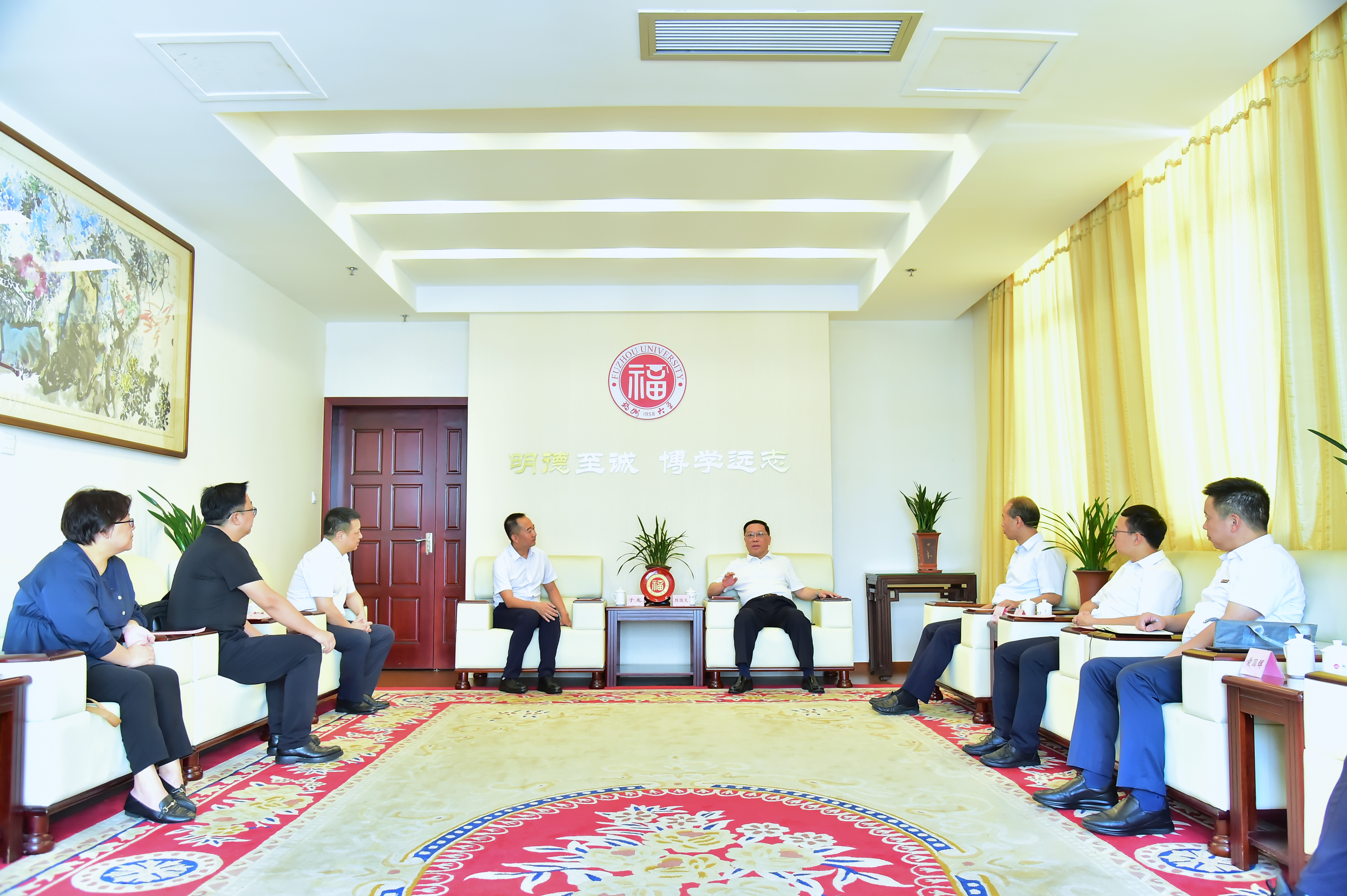 陈国龙书记接见西南交通大学于龙教授一行-丽人.jpg